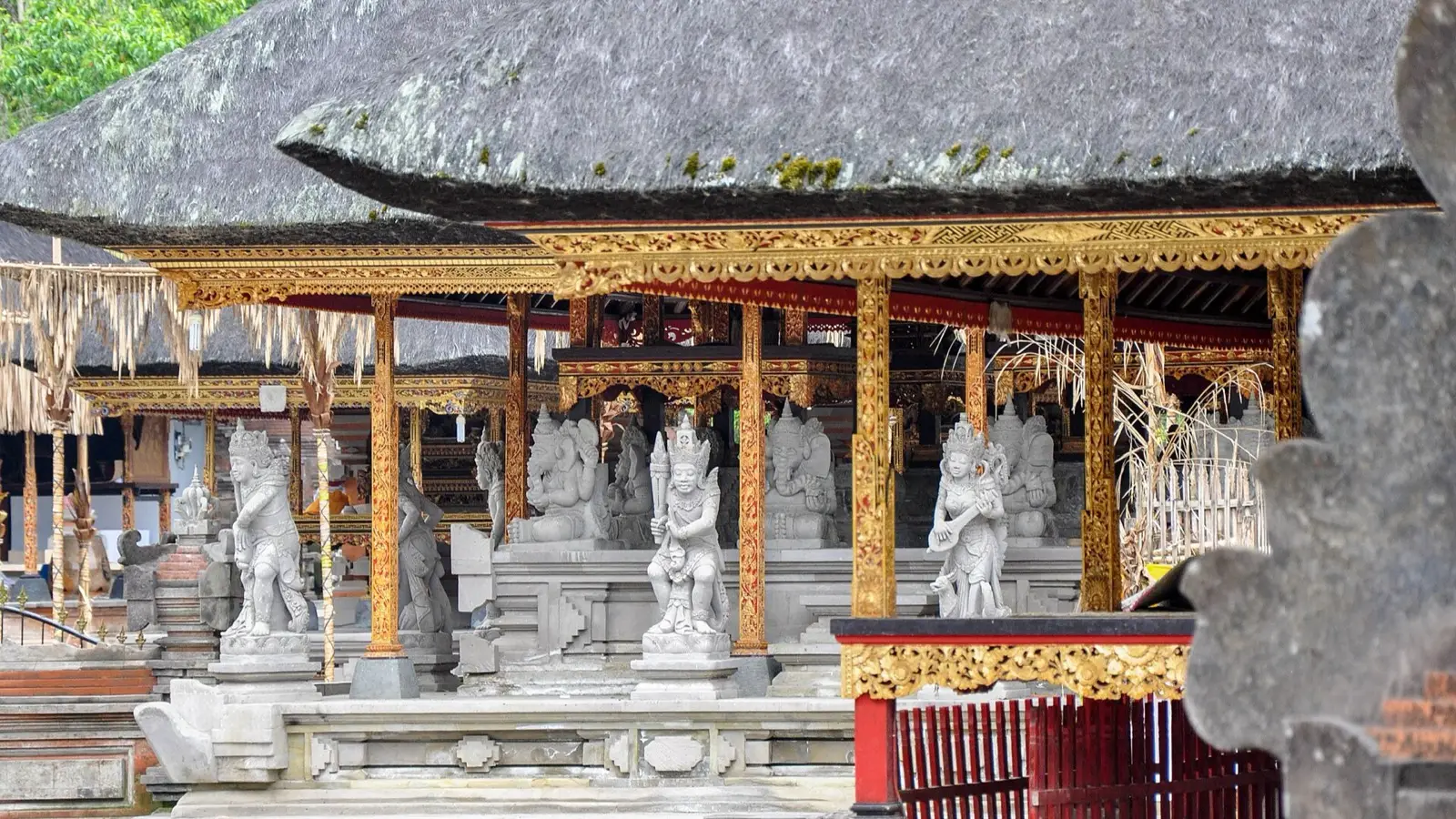 Sacred cleansing stone fountain fed by thousand-year natural springs at Tirta Empul