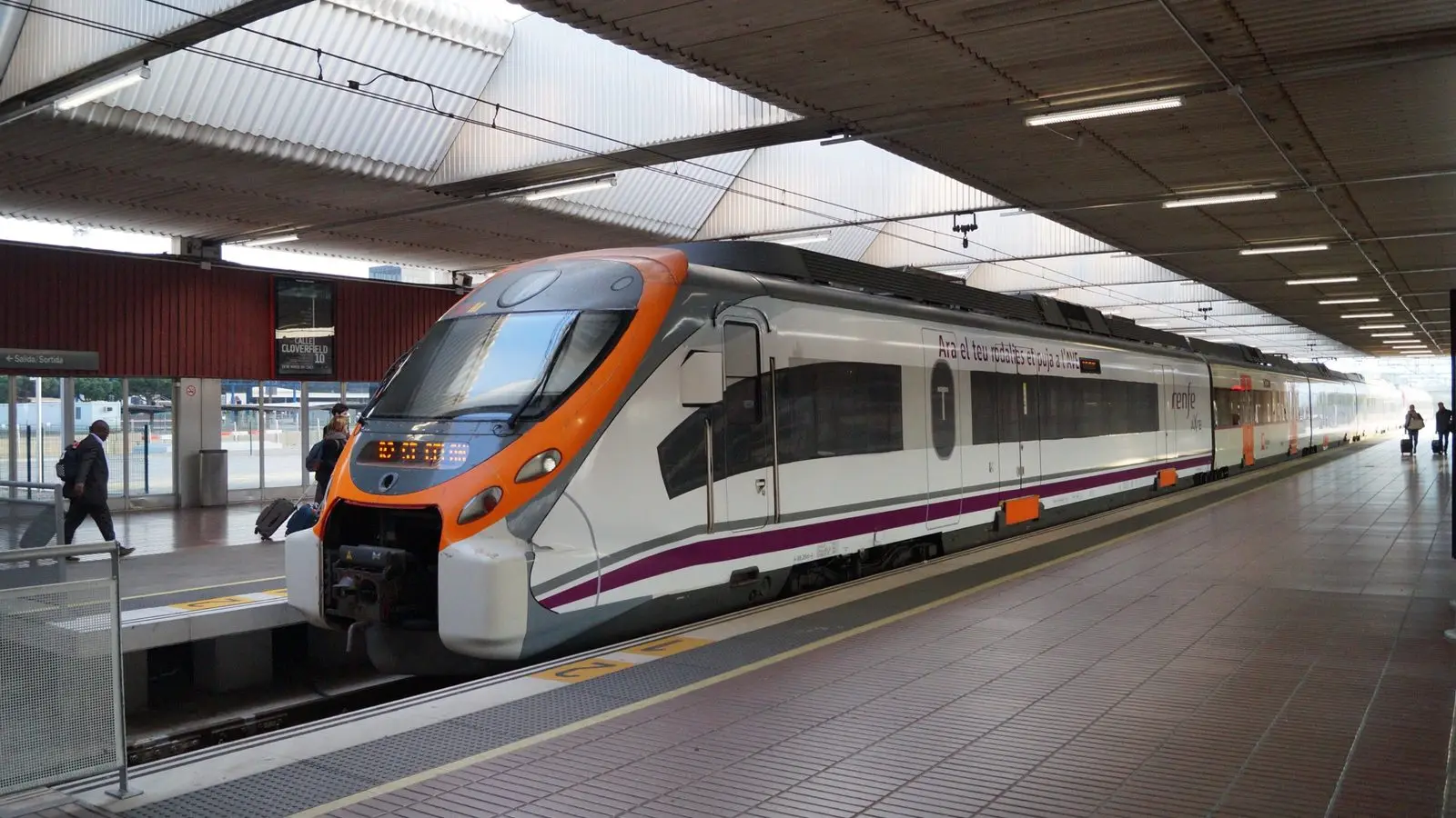 Renfe Rodalies R2 Nord suburban train linking El Prat Airport directly to Passeig de Gràcia
