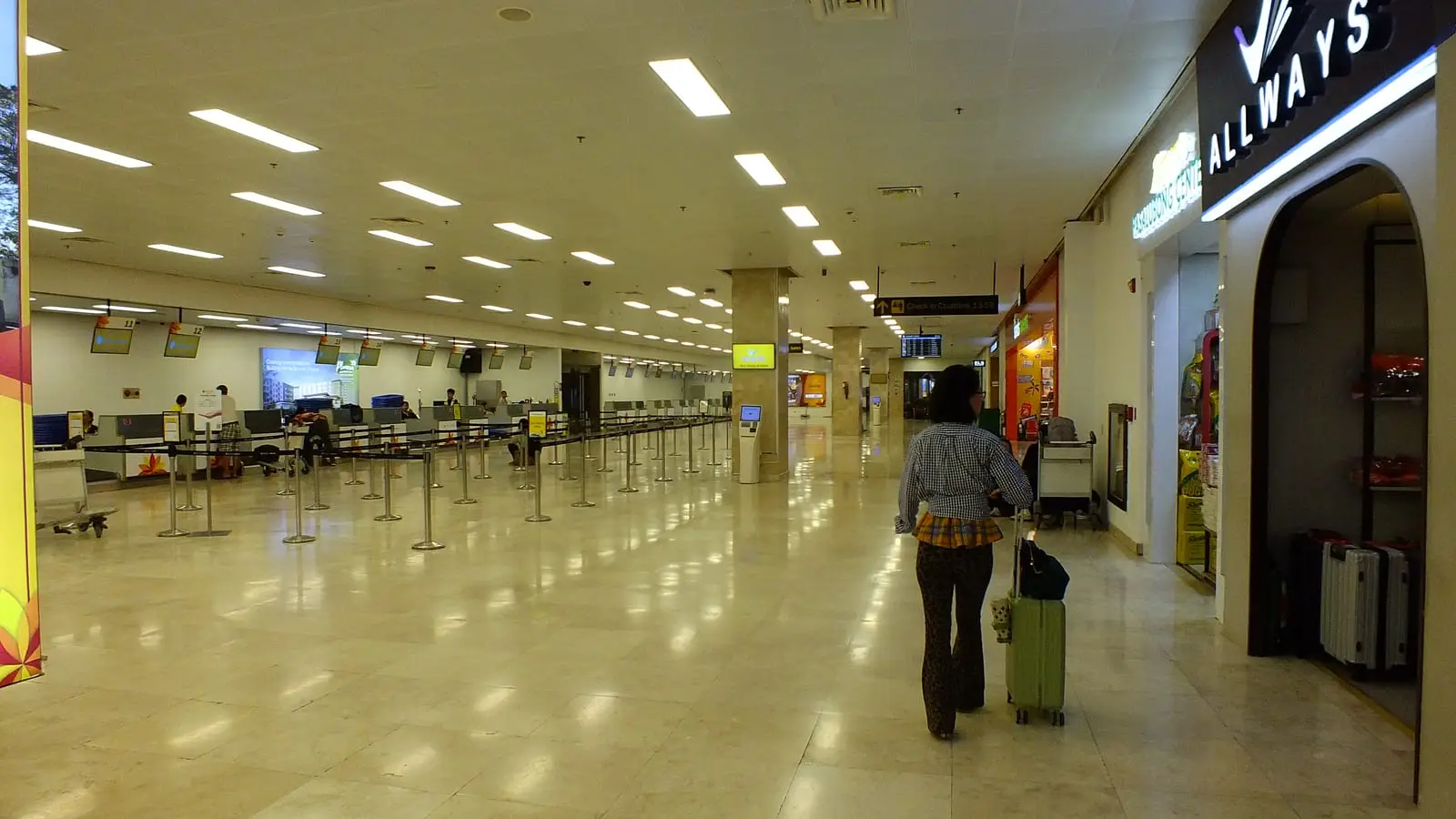 Sweeping undulating timber roof architecture inside Mactan-Cebu International Terminal 2 concourse