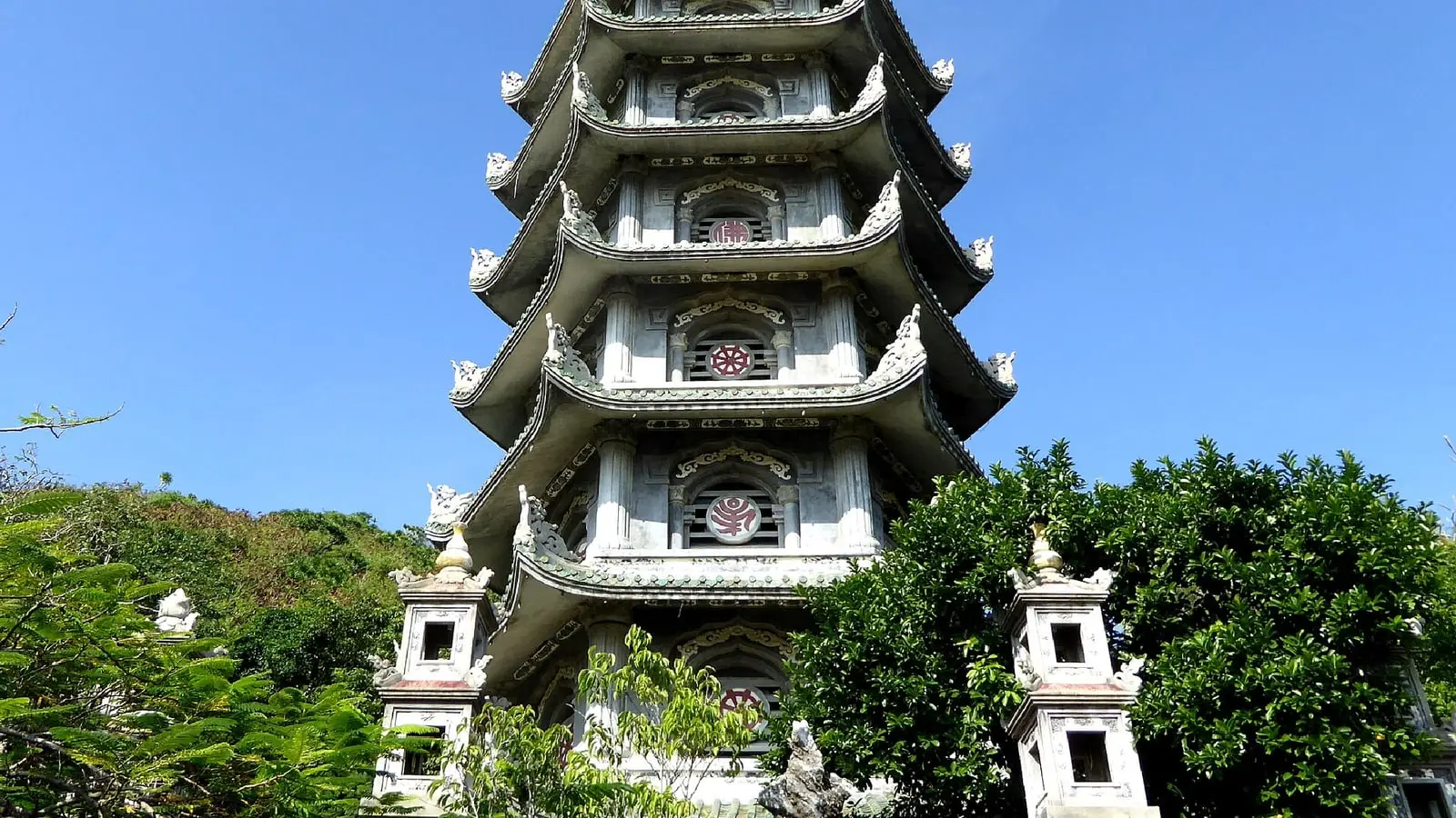 Ancient cave sanctuaries and stone pagodas overlooking the Da Nang coastline from the Marble Mountains