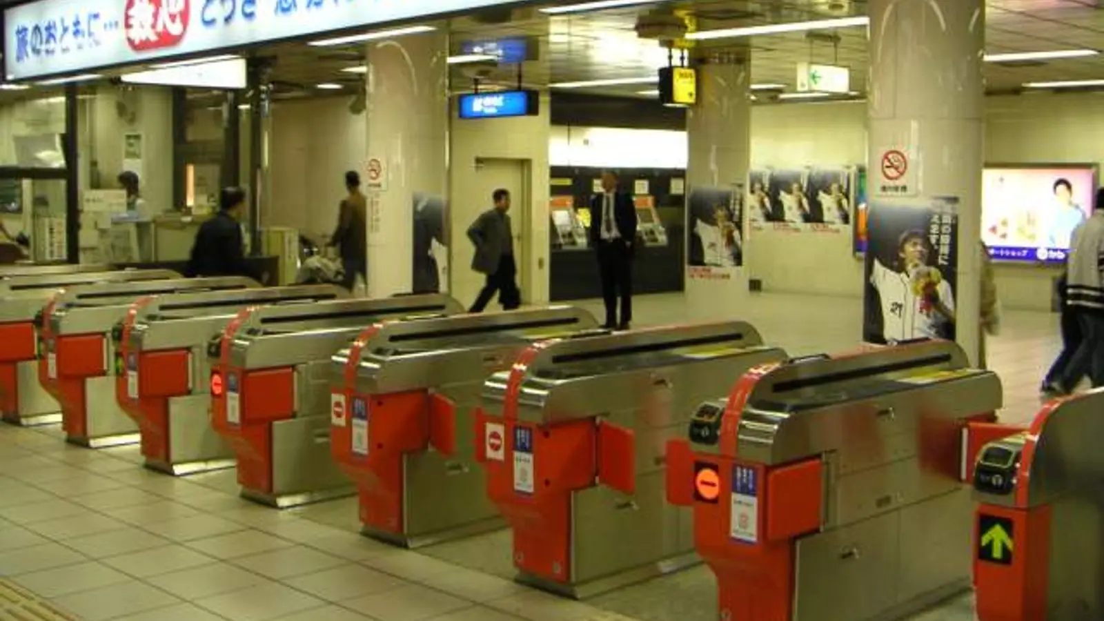 Fukuoka Airport subway station concourse and contactless credit card tap-and-go turnstiles