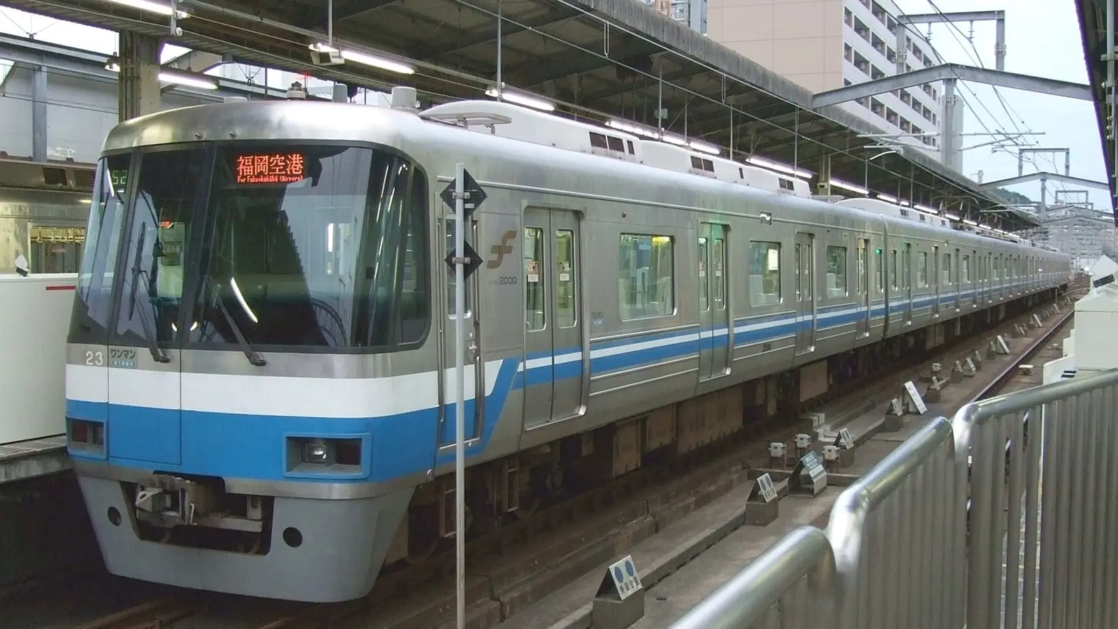 Clean and quiet Fukuoka City Subway Kuko Line train car interior connecting Hakata and Tenjin