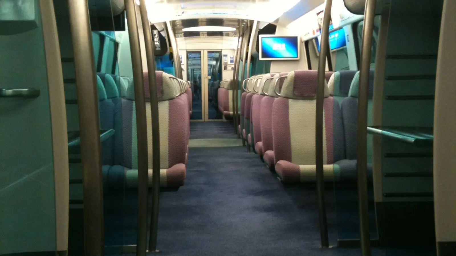 Airport Express (AEL) departure platform seamlessly integrated with Hong Kong Airport arrivals