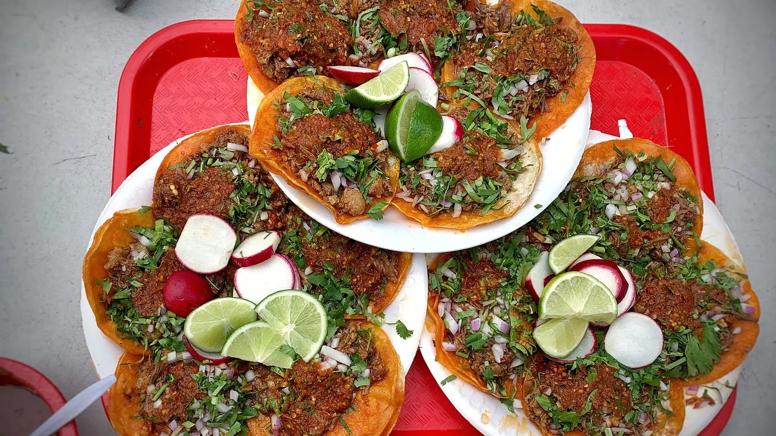 Authentic Los Angeles street tacos on warm corn tortillas topped with chargrilled meat, cilantro, and fresh lime