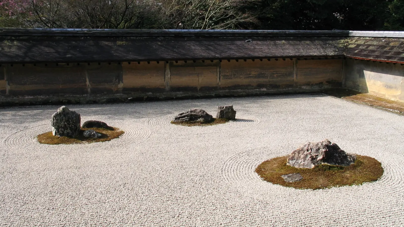 Traditional Japanese tatami suite overlooking a tranquil rock garden