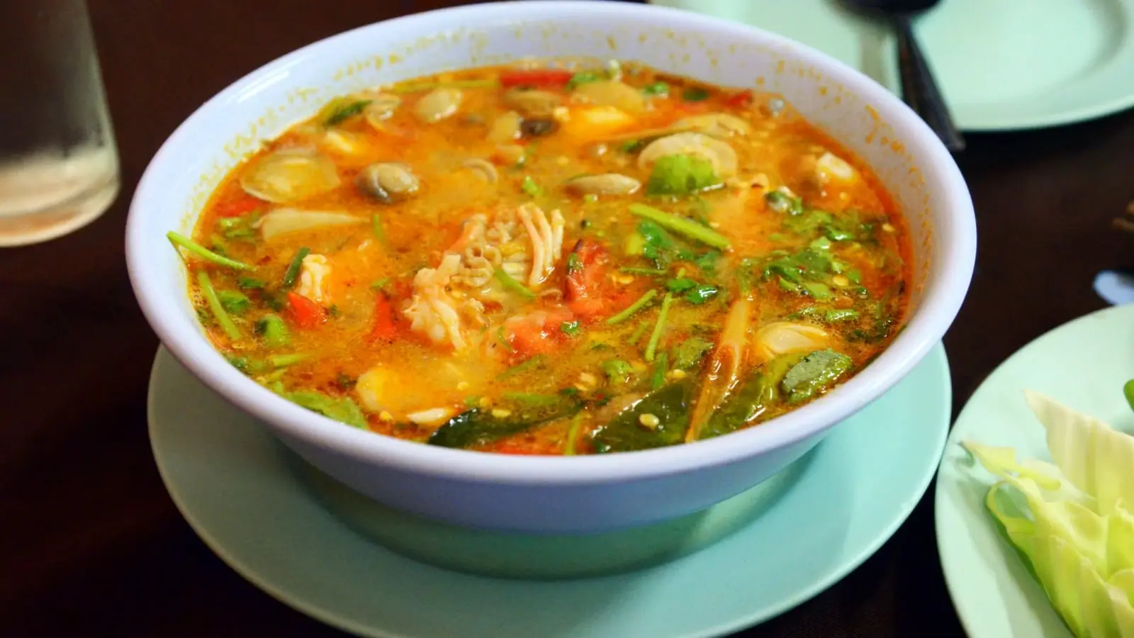 Aromatic Tom Yum Goong soup with Andaman prawns paired with sweet coconut mango sticky rice