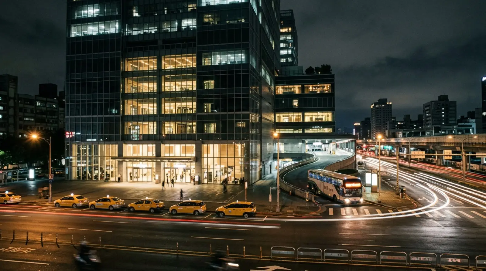 Taipei Bus Station beside Taipei Main Station at night, where the airport buses end their run